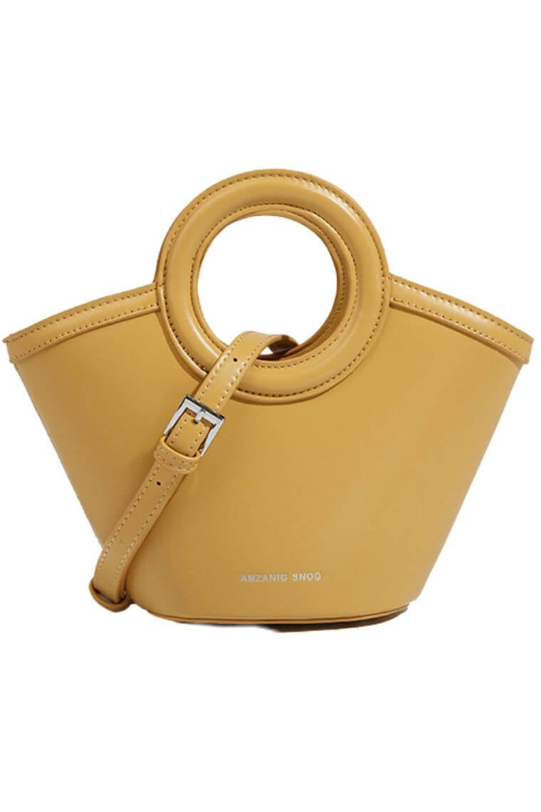 ladies small bag in dark yellow with crossbody strap & top handles with small pouch